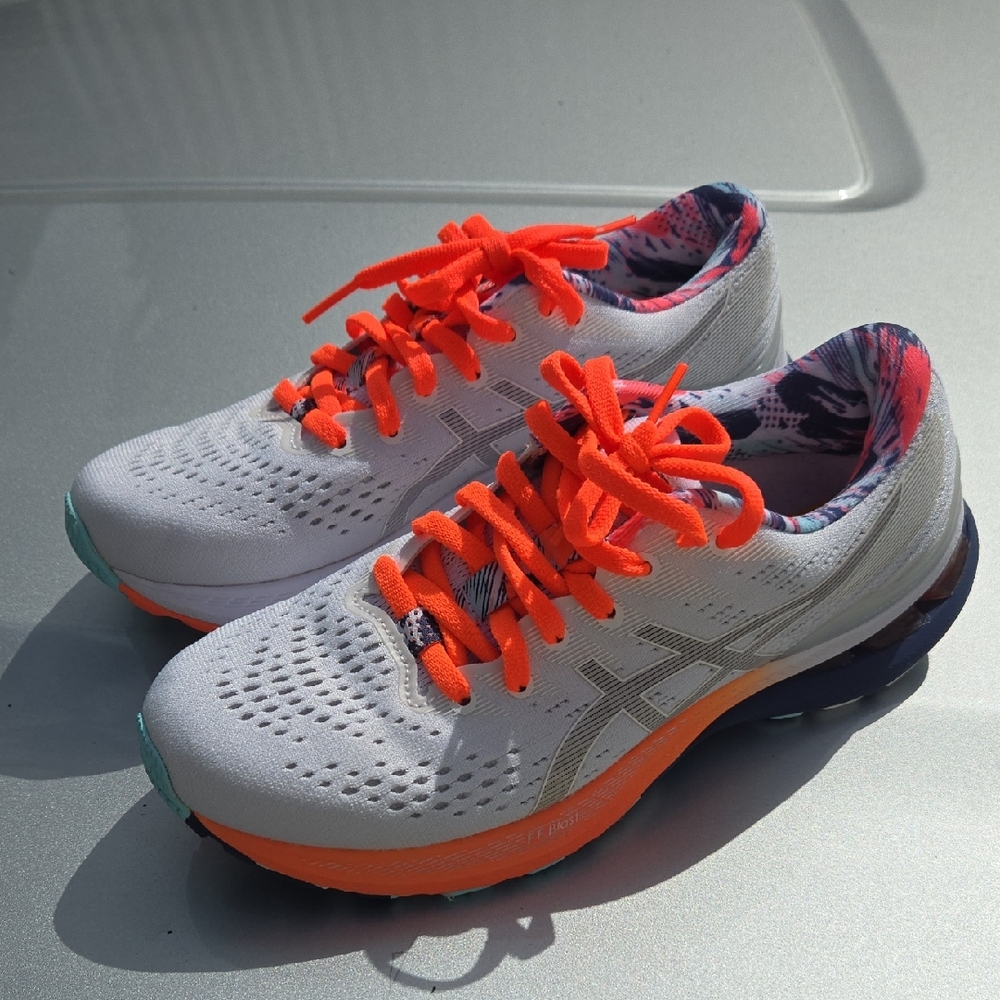 Asics Women's White Running Shoes with Bright Orange Laces